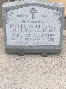 grey slant with doves, flowers and cross