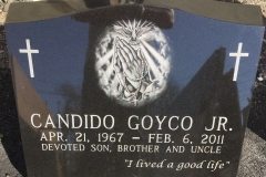 Black slant granite with cross and praying hands etching
